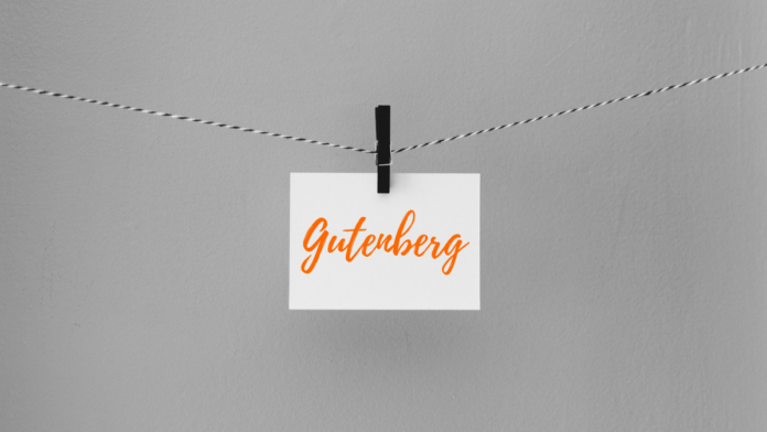 Grey background with white post it note with "Gutenberg" on it