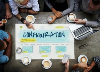 Overhead view of employees around a Configuration design chart - setting up WordPress