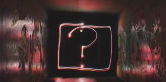 question mark in a darkish room - Have You Figured Out What Your "WHY" Is Yet?