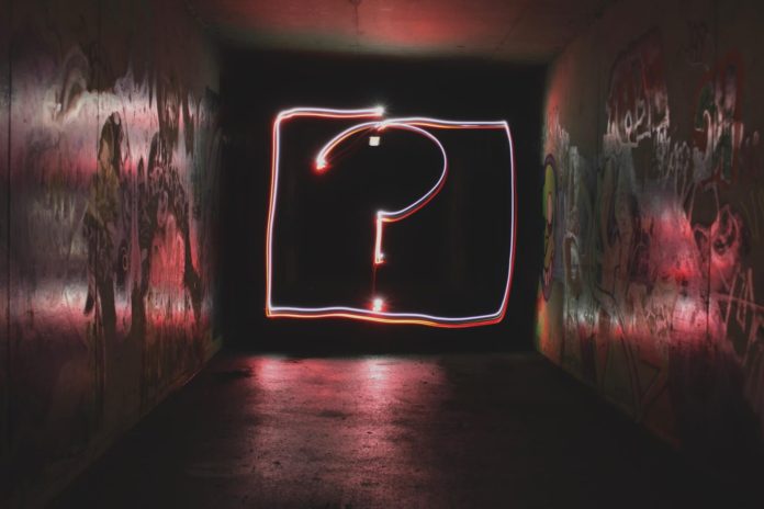 Have You Figured Out What Your WHY Is Yet - Feature question mark in a darkish room - Have You Figured Out What Your "WHY" Is Yet?